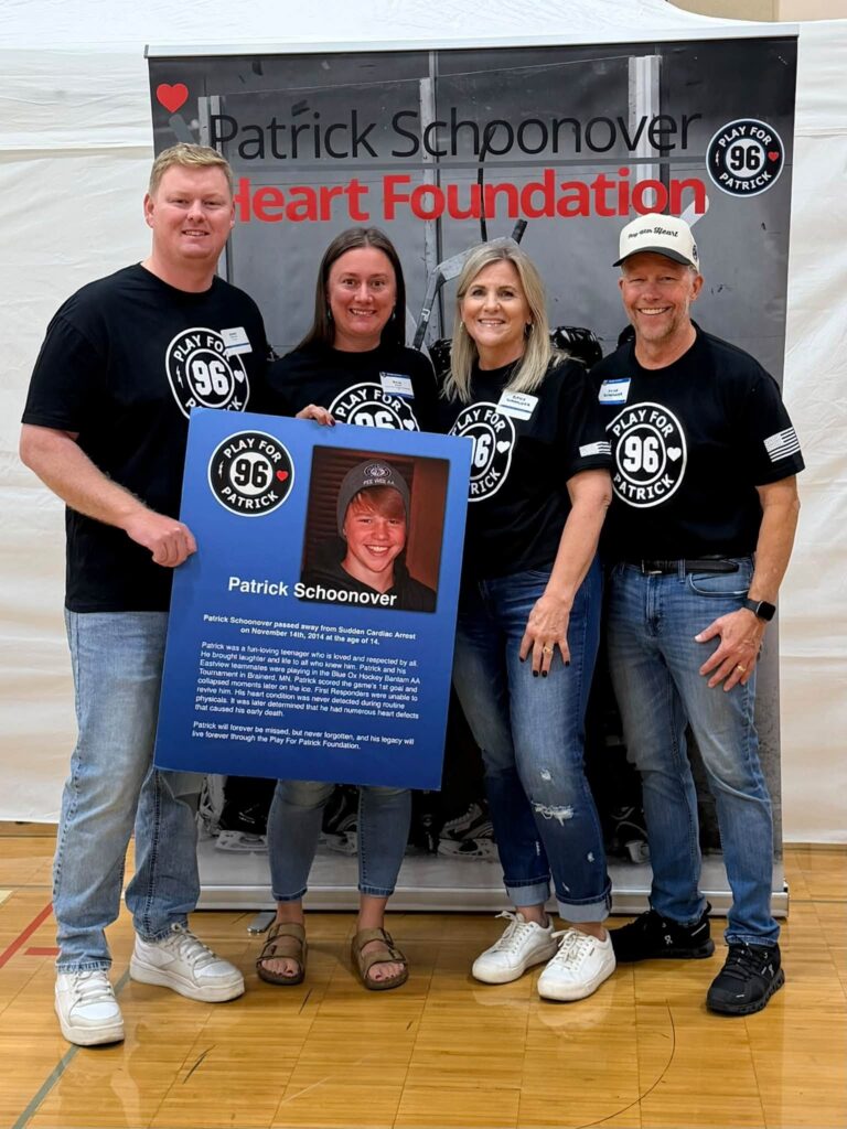 Play for Patrick team with the Patrick Schoonover Heart Foundation banner