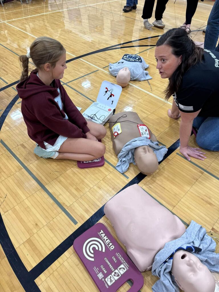 A participant learning hands-only CPR